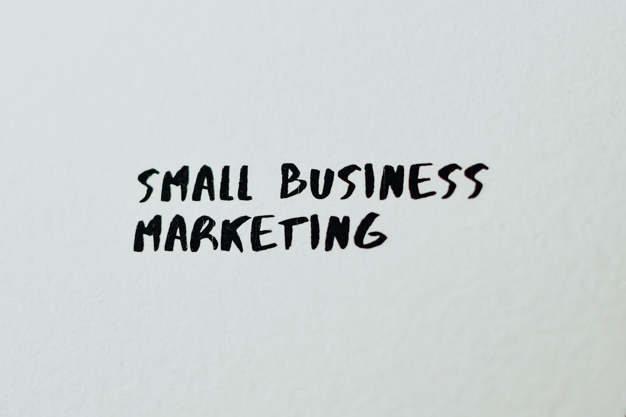 hero-img Text Small Business Marketing written on white paper for creative use.